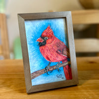 Art piece by Rowen Oaks ‘Winter Solstice Cardinal’